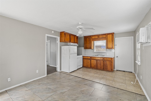 kitchen with ceiling fan, white appliances, and sink