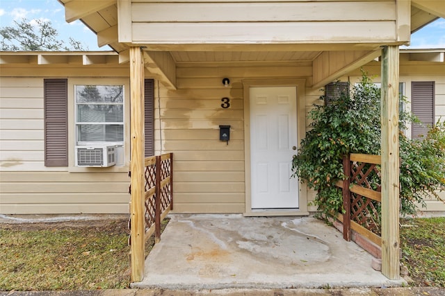 property entrance featuring cooling unit