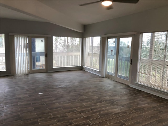 unfurnished sunroom with ceiling fan