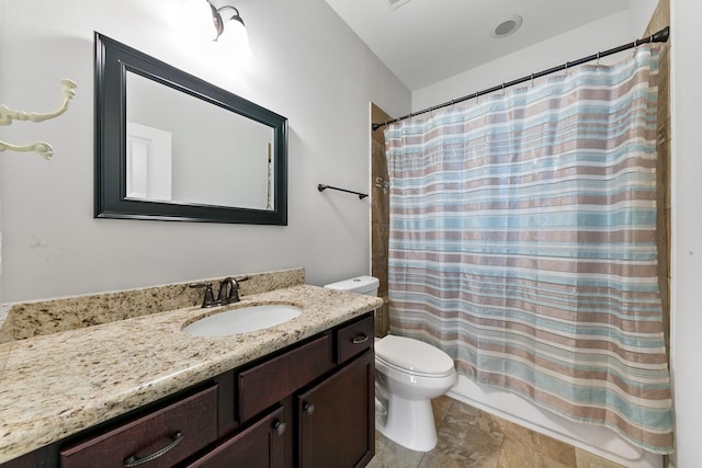 full bathroom with vanity, shower / bath combo, tile patterned floors, and toilet