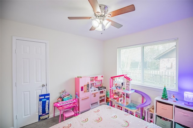 game room featuring ceiling fan and carpet floors