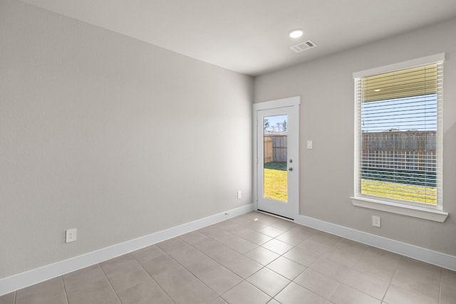 view of tiled spare room