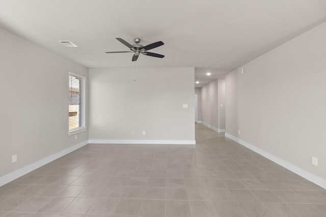 unfurnished room featuring ceiling fan