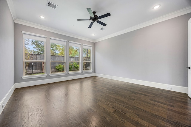 spare room with ornamental molding, ceiling fan, and dark hardwood / wood-style flooring