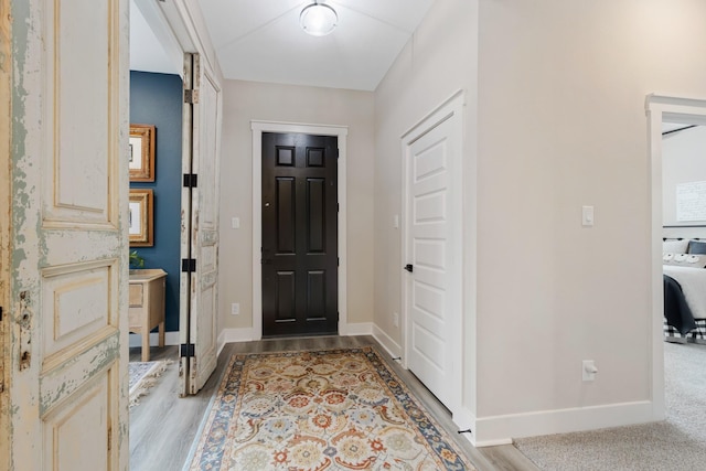 entryway with light hardwood / wood-style floors