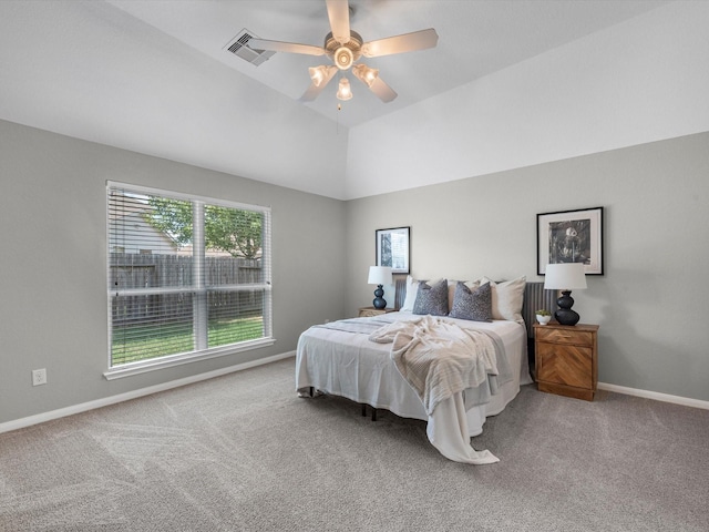 bedroom featuring multiple windows, carpet floors, and ceiling fan