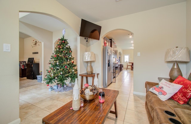 hallway featuring light tile patterned floors