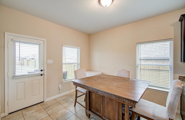 view of tiled dining space