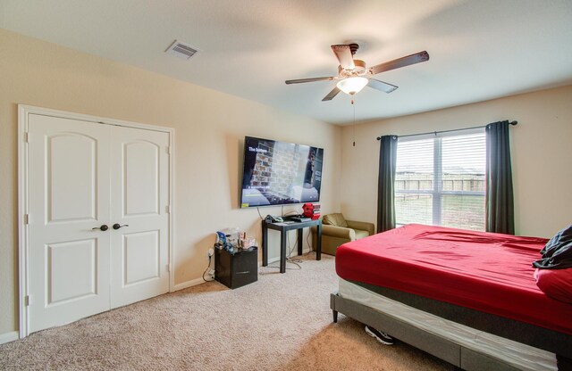 bedroom featuring carpet and ceiling fan