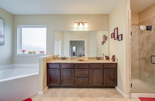 bathroom featuring vanity, separate shower and tub, and tile patterned floors