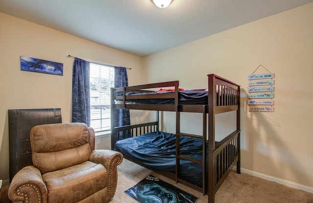 bedroom featuring carpet