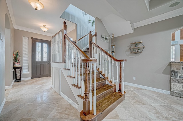 entryway featuring ornamental molding