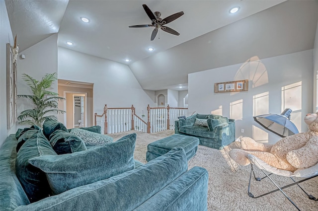 living room with lofted ceiling and ceiling fan