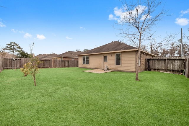 518 Lovers Ln, Dayton, TX 77535 - back of property featuring a yard and a patio