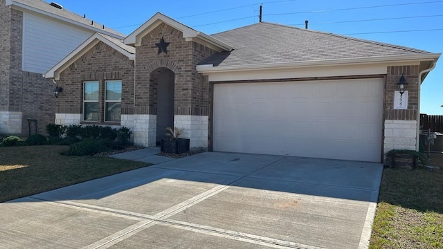 single story home featuring a garage