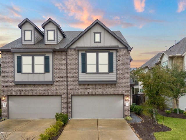 view of front of property with a garage