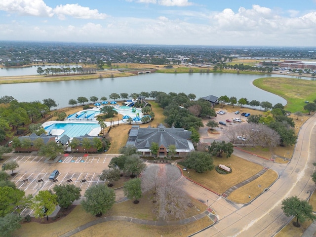 birds eye view of property featuring a water view