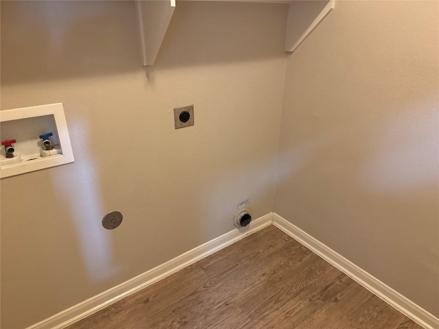 clothes washing area with hookup for an electric dryer, hookup for a washing machine, and hardwood / wood-style floors