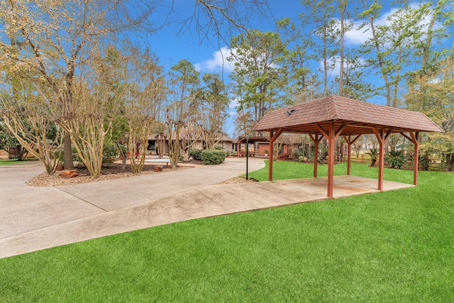 view of community featuring a lawn