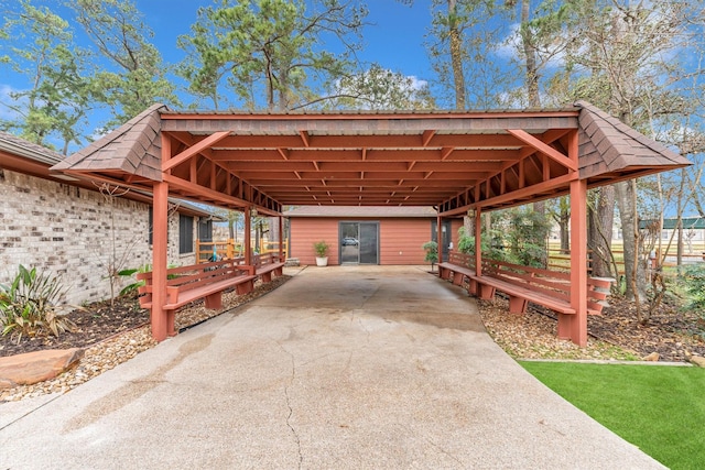 exterior space with a carport