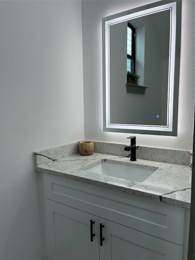 bathroom featuring vanity