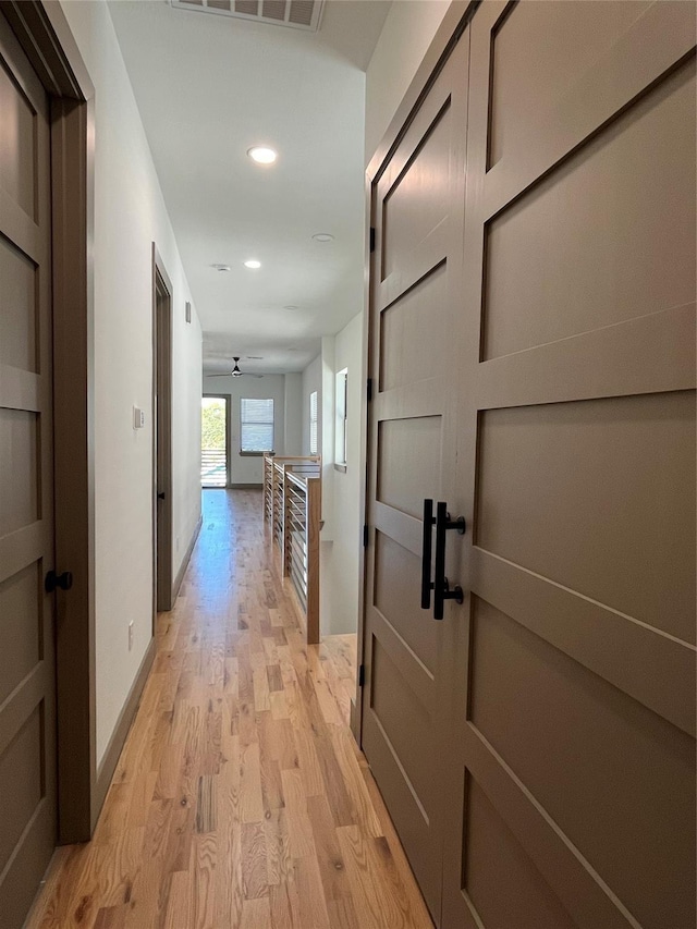 hallway featuring light hardwood / wood-style floors