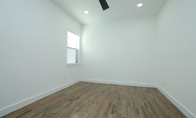 unfurnished room featuring ceiling fan and wood-type flooring