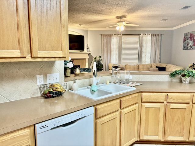 kitchen featuring ornamental molding, white dishwasher, sink, and light brown cabinets