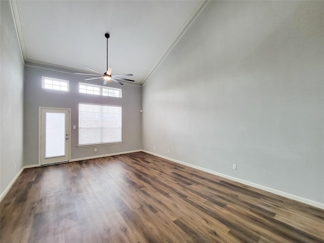 unfurnished room with crown molding, dark wood-type flooring, and ceiling fan