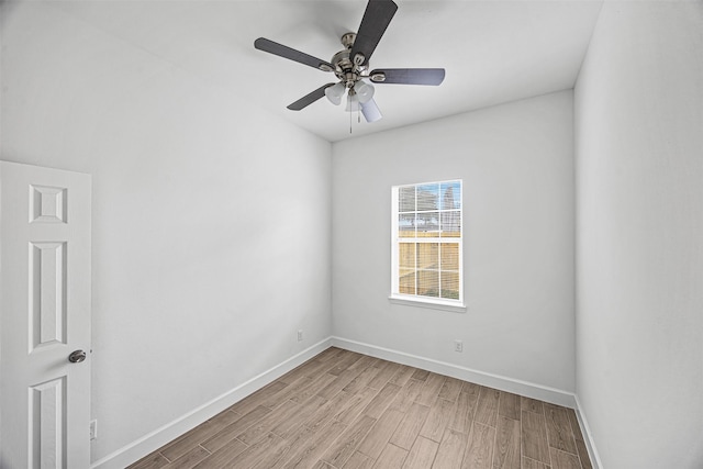 empty room featuring ceiling fan and light hardwood / wood-style floors