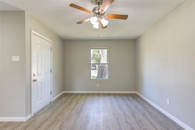 unfurnished room featuring ceiling fan and light hardwood / wood-style floors