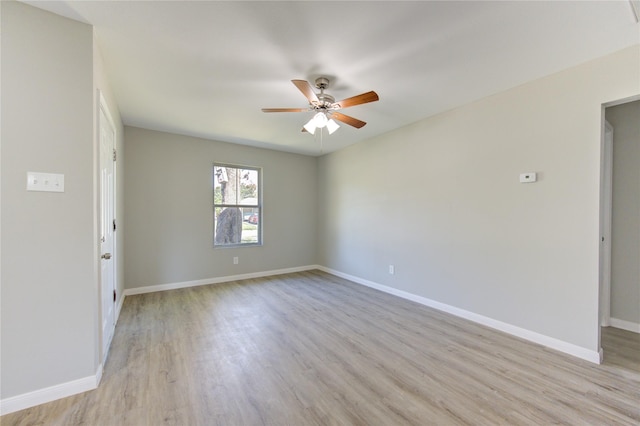 unfurnished room with ceiling fan and light hardwood / wood-style flooring