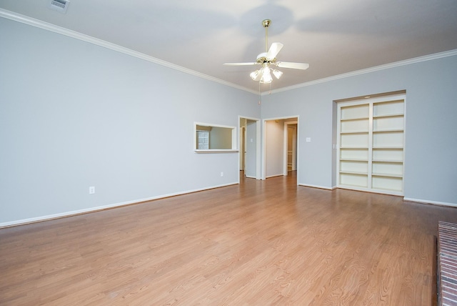 spare room featuring crown molding, light hardwood / wood-style flooring, and ceiling fan