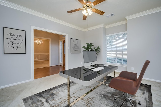 carpeted home office featuring crown molding and ceiling fan with notable chandelier