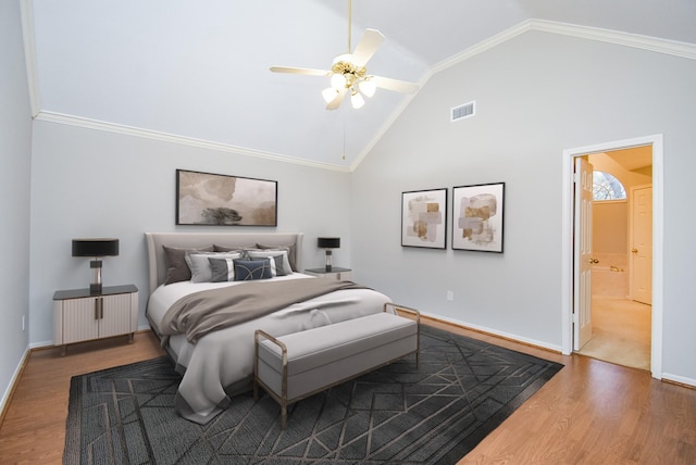 bedroom with crown molding, hardwood / wood-style flooring, high vaulted ceiling, and ceiling fan