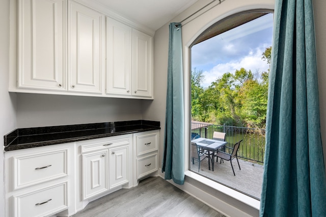 laundry room with light hardwood / wood-style floors