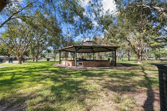 view of community with a gazebo and a lawn