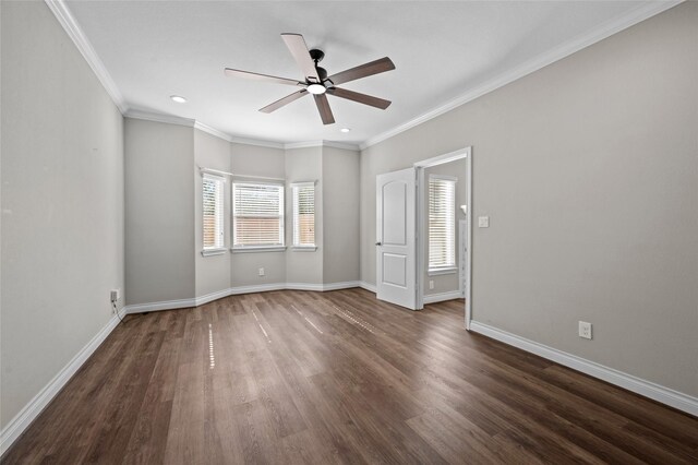 unfurnished bedroom featuring dark wood-type flooring, ornamental molding, and ceiling fan