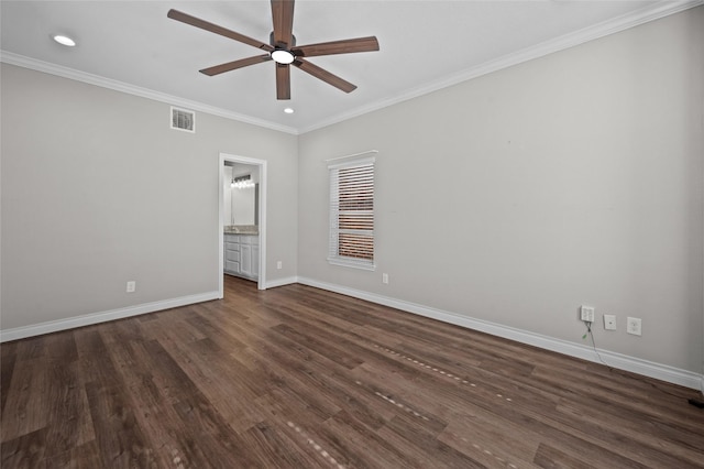 spare room with ceiling fan, ornamental molding, and dark hardwood / wood-style flooring