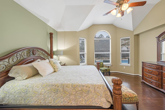 bedroom with ceiling fan, lofted ceiling, and dark hardwood / wood-style flooring