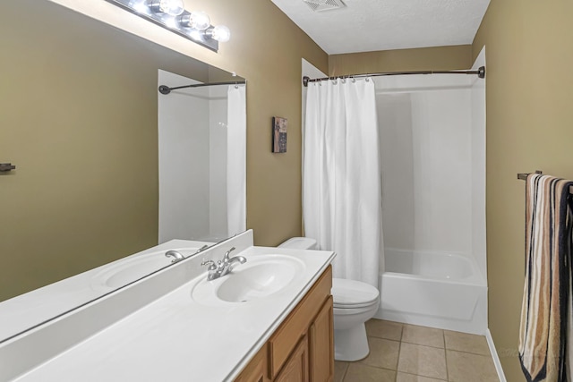 full bathroom featuring tile patterned flooring, vanity, toilet, shower / bathtub combination with curtain, and a textured ceiling