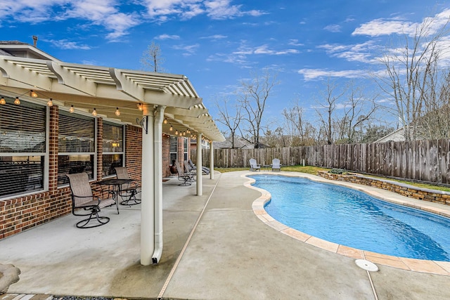 view of pool featuring a patio and a pergola