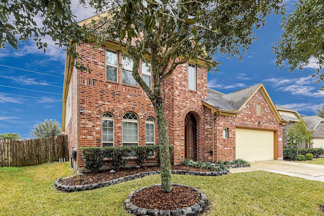 view of front of property featuring a garage and a front lawn