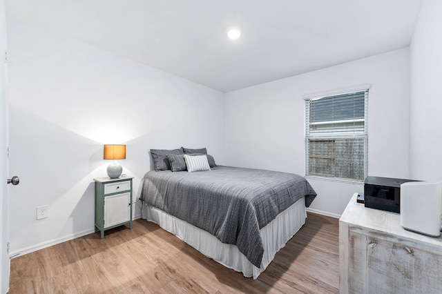 bedroom featuring light hardwood / wood-style floors