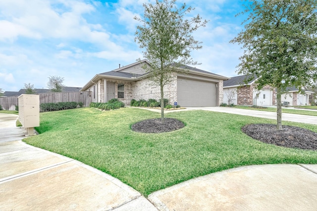 ranch-style house featuring a garage and a front yard