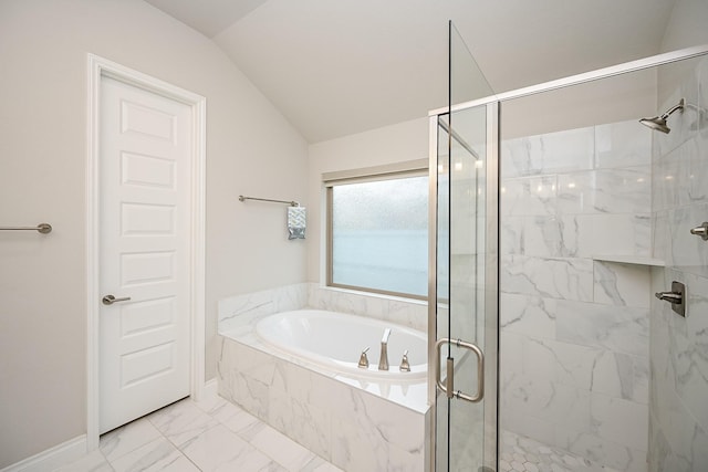 bathroom with vaulted ceiling and separate shower and tub