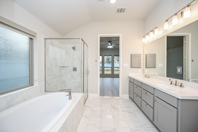 bathroom featuring vanity, plus walk in shower, and vaulted ceiling