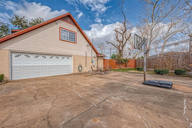 view of side of property featuring a garage