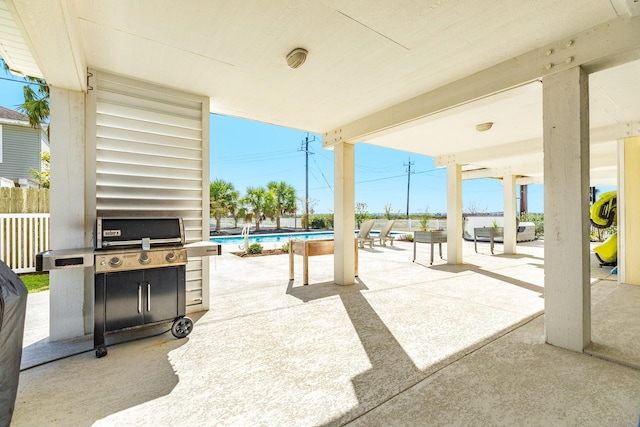 view of patio with a grill