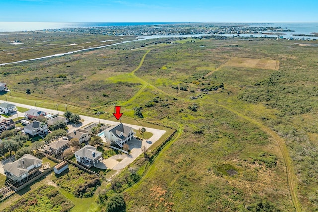 bird's eye view featuring a water view and a rural view